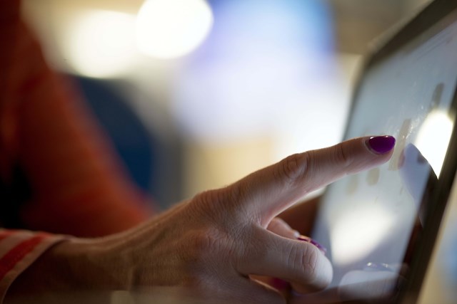 User Navigating Website via Touchscreen